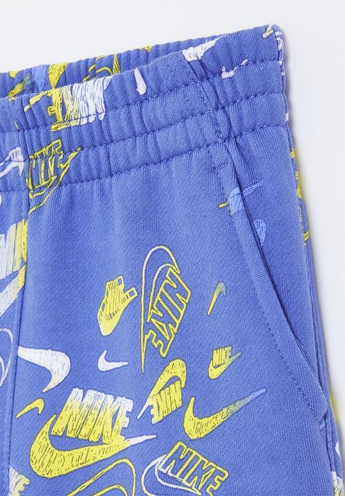 Nike - Nike all-over print reveal joggers - comet blue