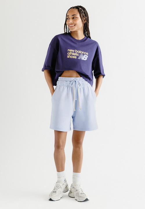 New Balance  - NB Athletics Premium Chest Logo Tee - Boysenberry