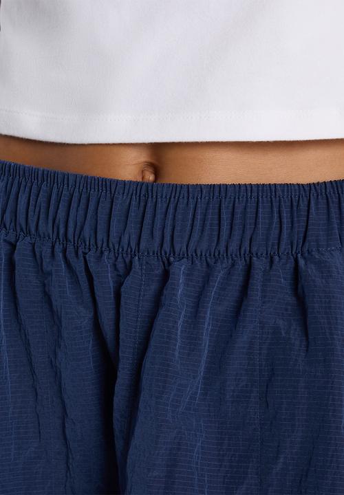 New Balance  - NB Athletics Sport Legacy Skirt - NB Navy