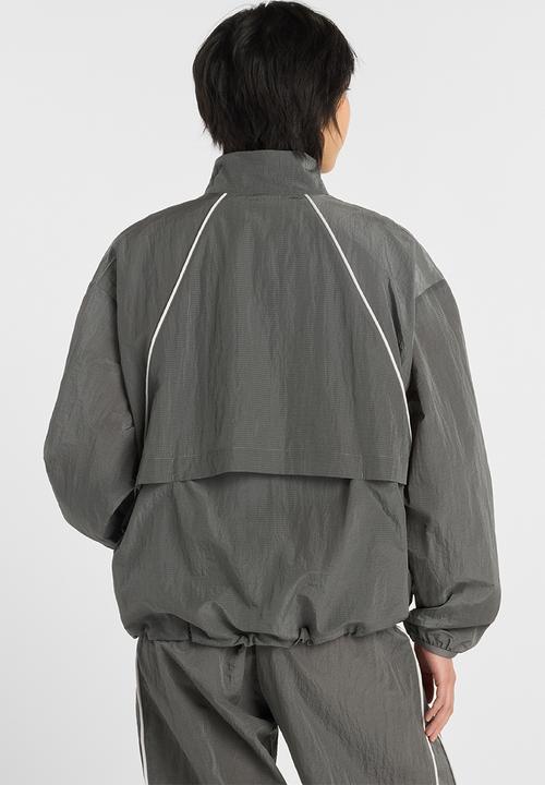 New Balance  - NB Athletics Sport Legacy Jacket - Castlerock