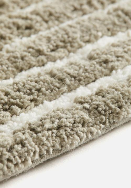 H&M - Tufted cotton bath mat -  light khaki green/striped