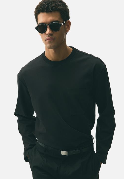 Loose fit long-sleeved jersey top - black - 1298049002