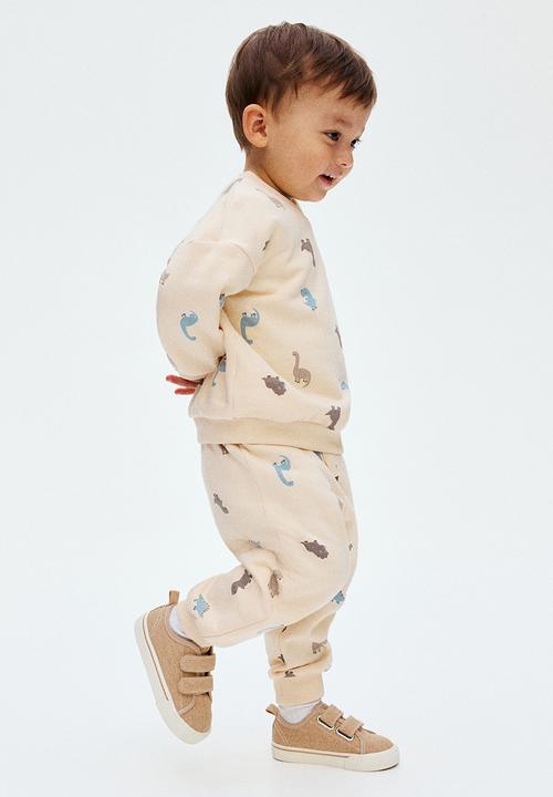 H&M - 2-piece printed brushed-inside sweatshirt set - light beige dinosaurs