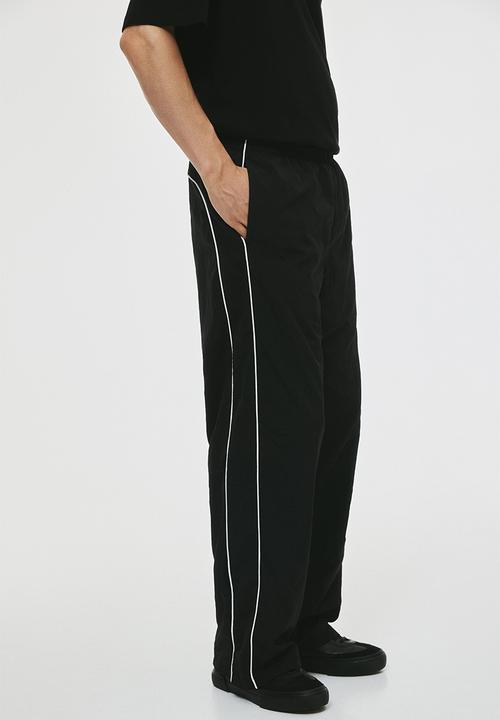 Relaxed fit nylon track pants - black - 1308781001