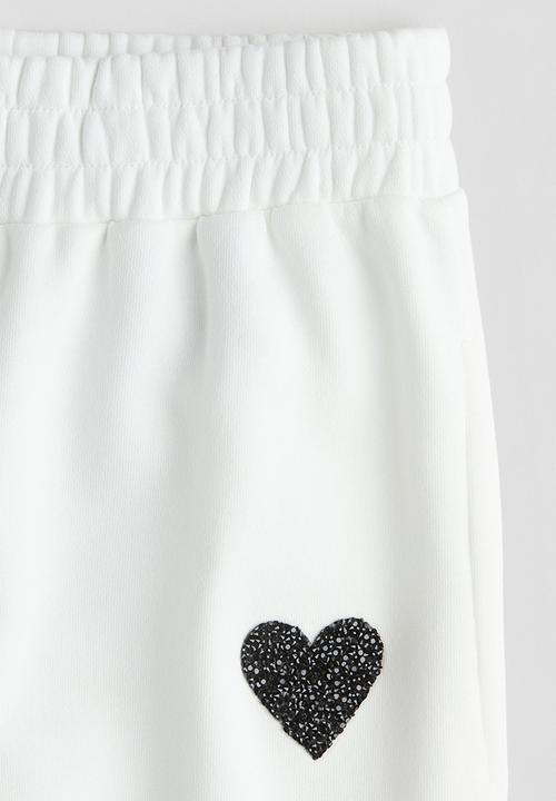 H&M - Straight sweatshirt joggers - white/heart 