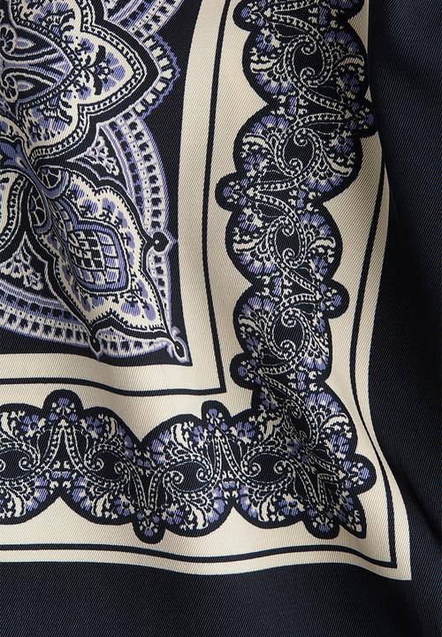 H&M - Straight trousers - navy blue/patterned 