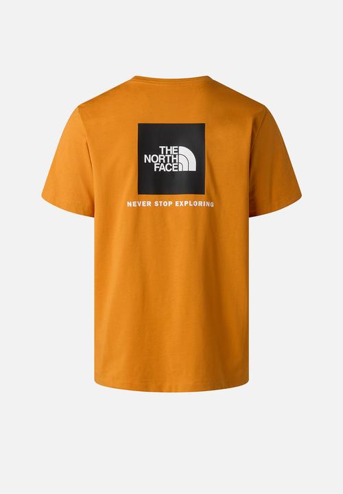 The North Face - M Evolution Box Nse Regular Short Sleeve Tee - Dust Orange