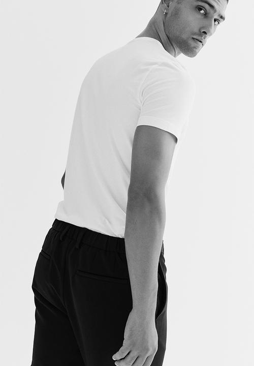 H&M - Slim fit cropped trousers - black