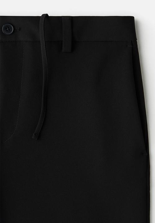 H&M - Slim fit cropped trousers - black