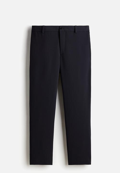 H&M - Slim fit cropped trousers - navy blue
