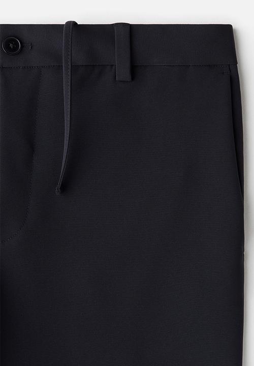 H&M - Slim fit cropped trousers - navy blue