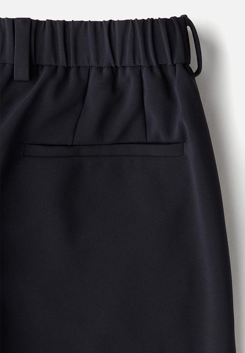 H&M - Slim fit cropped trousers - navy blue