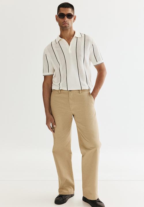 H&M - Regular fit polo shirt - white striped