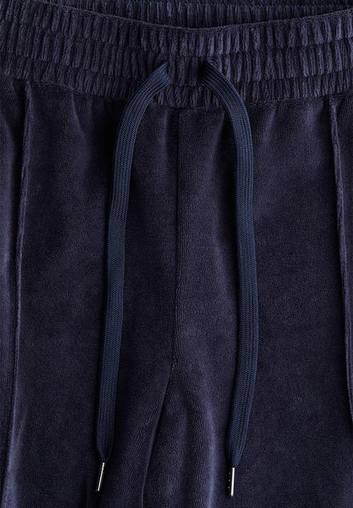 H&M - Wide velour joggers - navy blue 