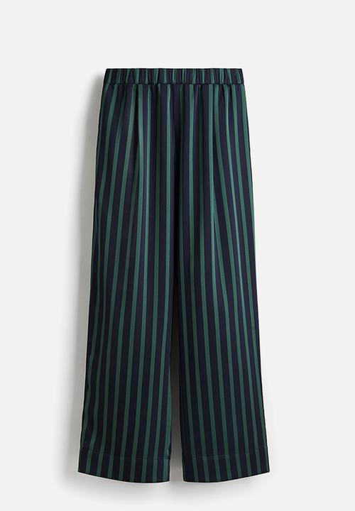H&M - Pull-on trousers - navy blue/green striped