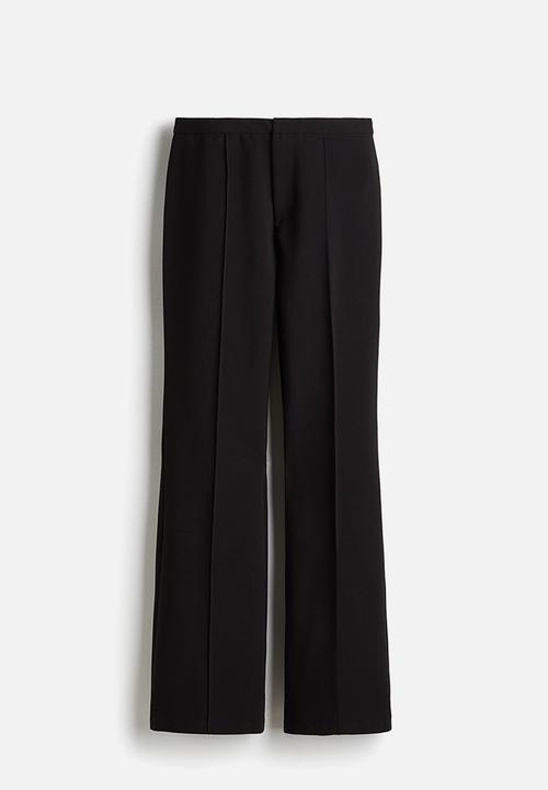 H&M - Flared trousers - black