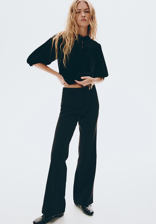 H&M - Flared trousers - black