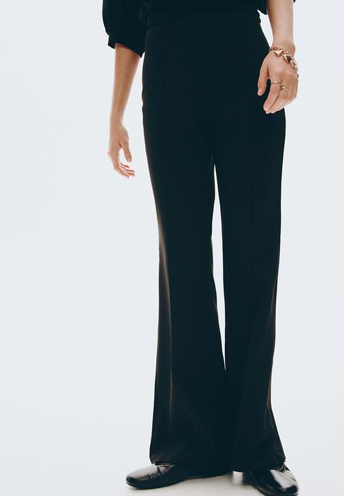 H&M - Flared trousers - black