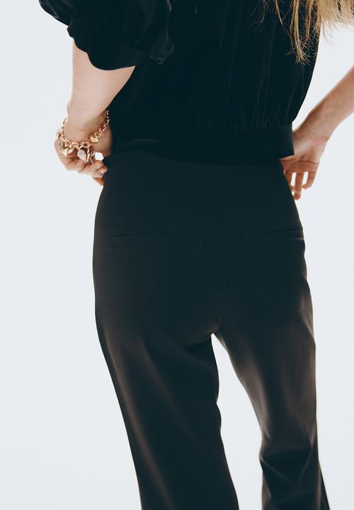 H&M - Flared trousers - black