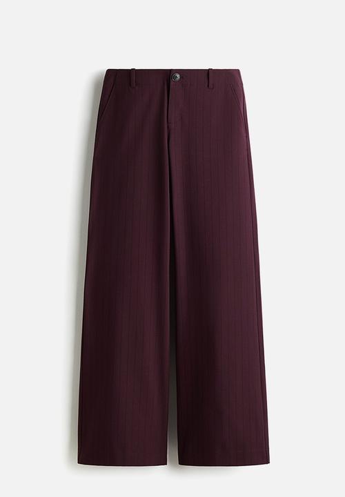 H&M - Wide trousers - burgundy/pinstriped