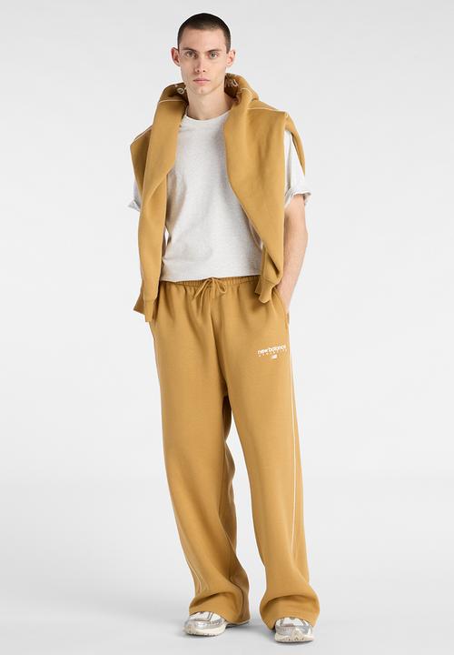 New Balance  - New Balance Linear Graphic Brushed Fleece Pant - Brown