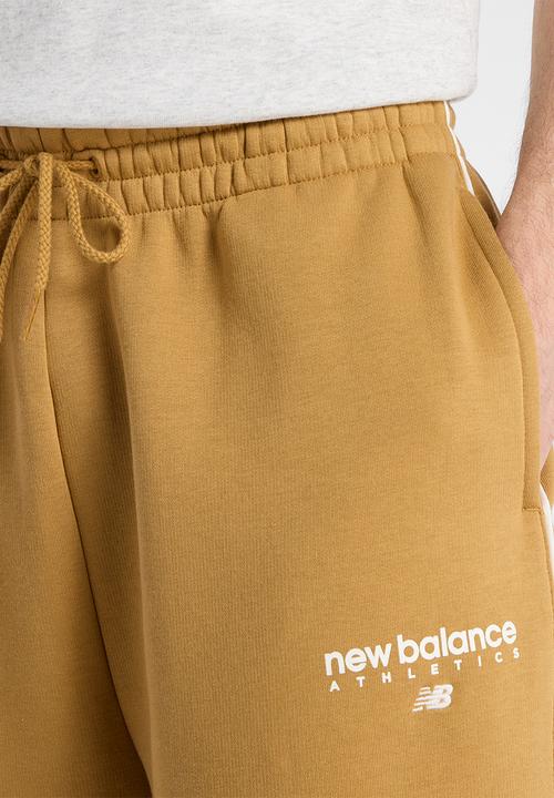 New Balance  - New Balance Linear Graphic Brushed Fleece Pant - Brown