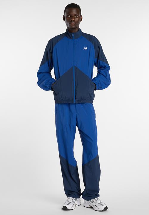 New Balance  - NB Athletics Sport Legacy Pant - Blue