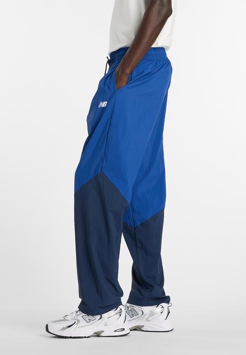 New Balance  - NB Athletics Sport Legacy Pant - Blue