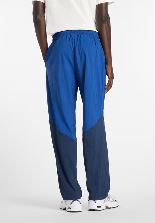 New Balance  - NB Athletics Sport Legacy Pant - Blue