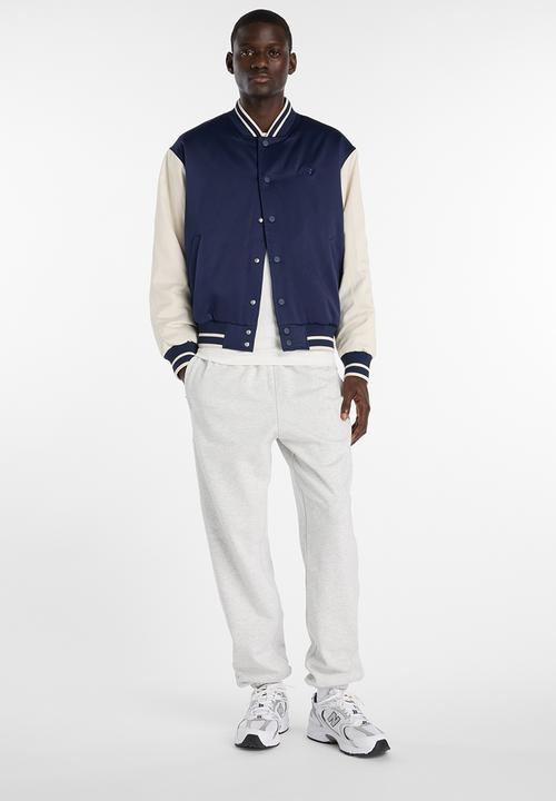 New Balance  - NB Athletics Varsity Jacket - Blue