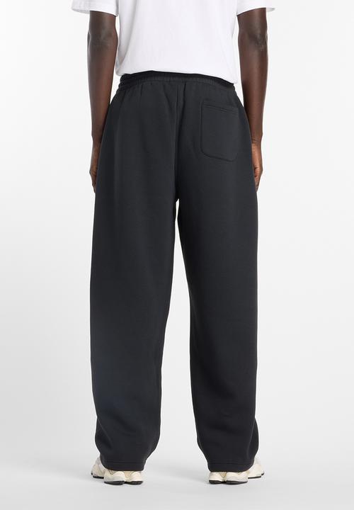 New Balance  - New Balance Brushed Open Hem Fleece Pant - Black