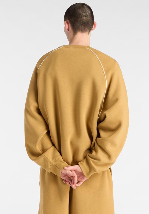 New Balance  - New Balance Linear Graphic Brushed Fleece Crew - Brown