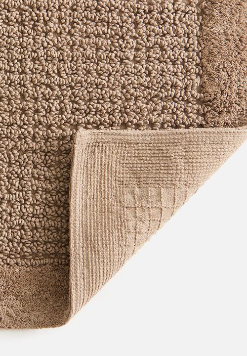 H&M - Tufted cotton bath mat - beige