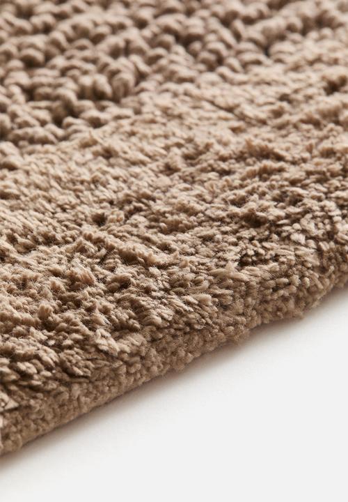 H&M - Tufted cotton bath mat - beige