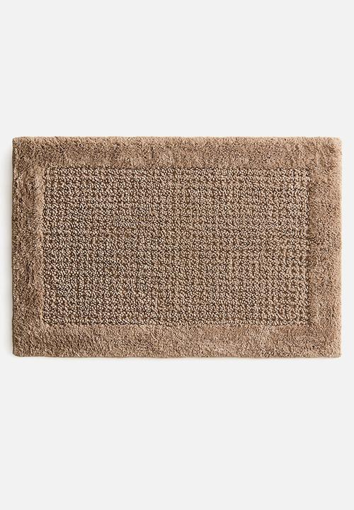 Tufted cotton bath mat - beige