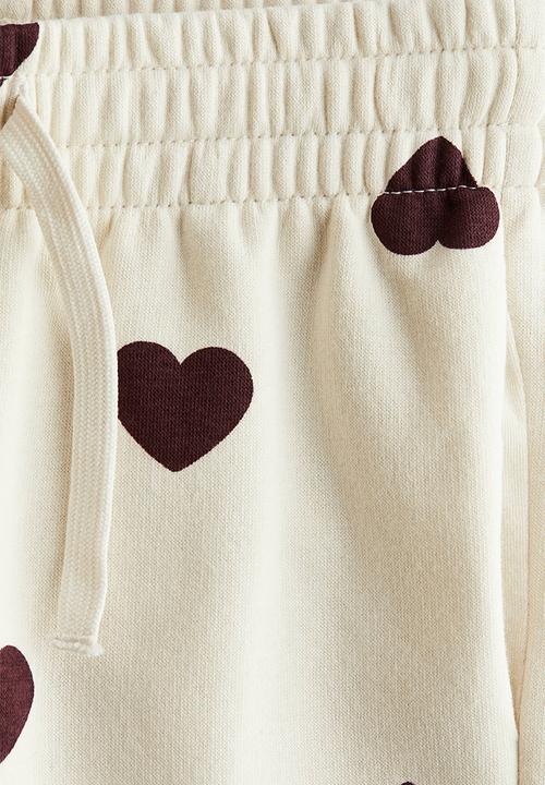 H&M - Brushed-inside joggers - white hearts