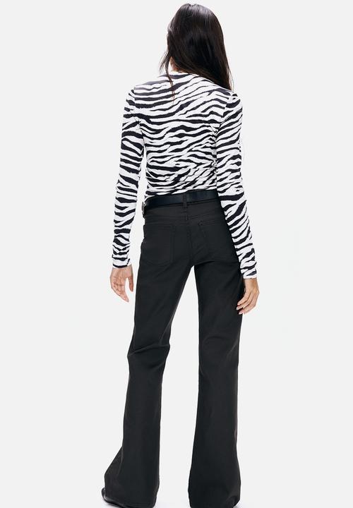 H&M - Flared low jeans - black
