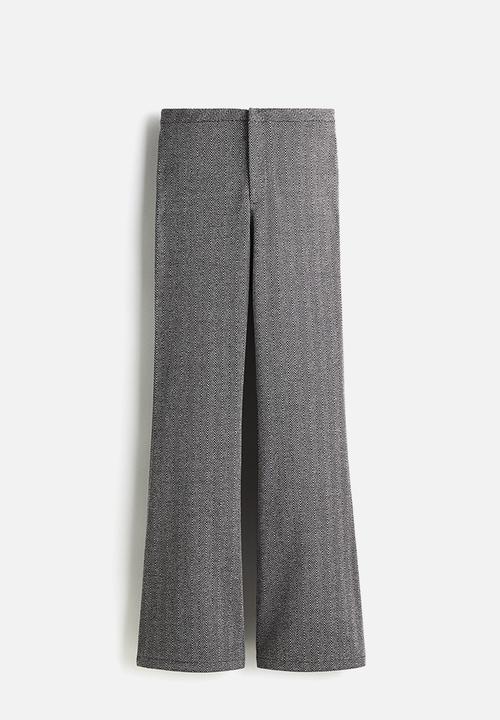 H&M - Flared trousers - black & grey patterned