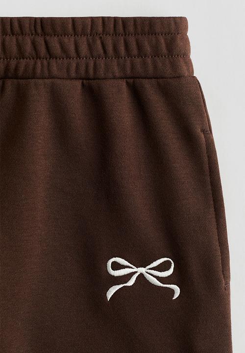 H&M - Straight sweatshirt joggers - dark brown/bow 