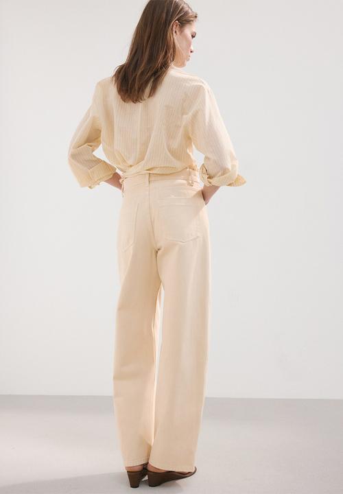 MANGO - Jeans blues- light pastel yellow