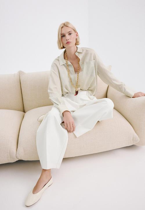 MANGO - Shirt poke - light/pastel yellow
