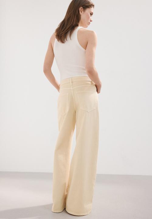 MANGO - Jeans iris- light/pastel yellow
