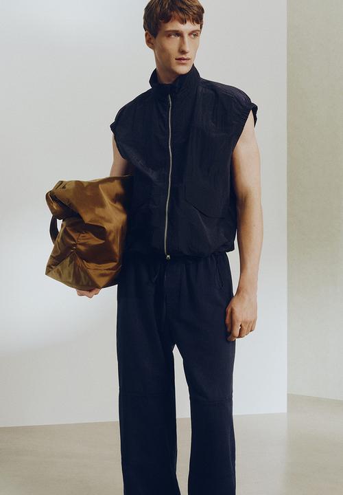 H&M - H&M Atelier: Loose fit linen-blend trousers - navy blue