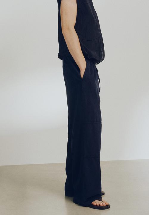 H&M - H&M Atelier: Loose fit linen-blend trousers - navy blue