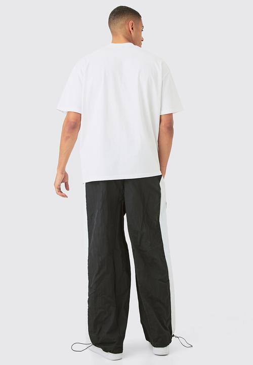 boohooMAN - OFCL Side Panel Parachute Pants - Black