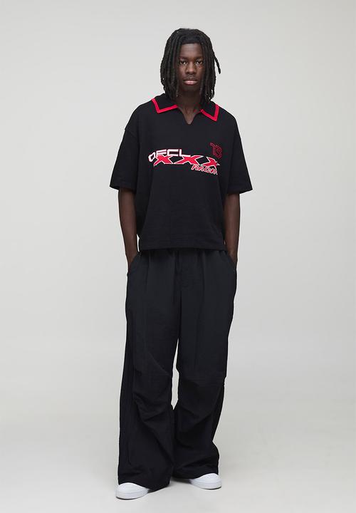 boohooMAN - Oversized Boxy OFCL Knitted Football Polo - Black