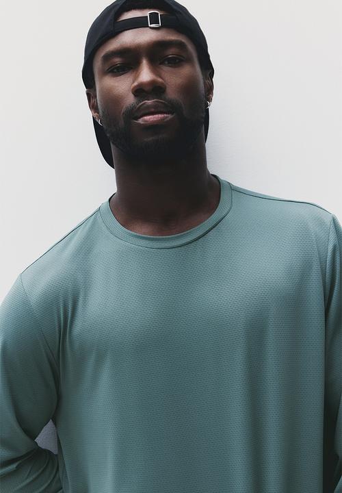 H&M - Long-sleeved sports top with drymove™ - green