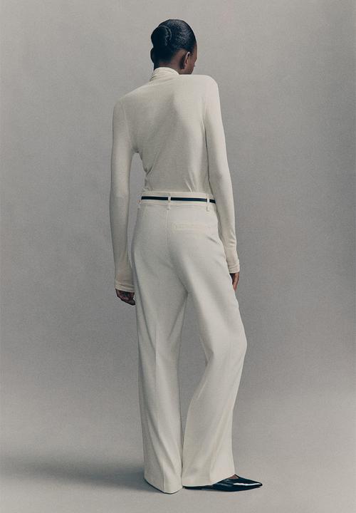 H&M - Flared belted trousers - cream