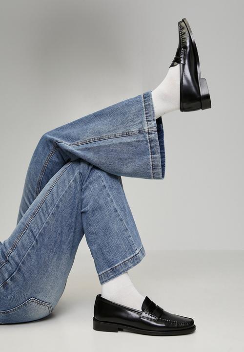 MANDI - High Waisted Wide Leg Denim Jean With Kick Flare Hem - Mid Denim