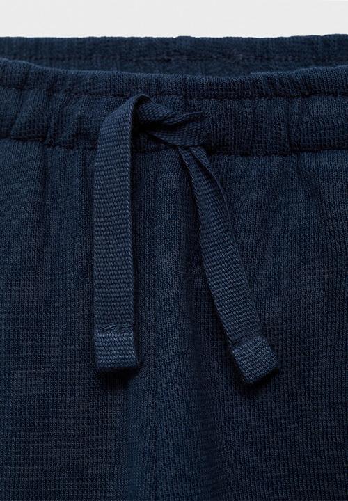 MANGO - Trousers gofre - navy